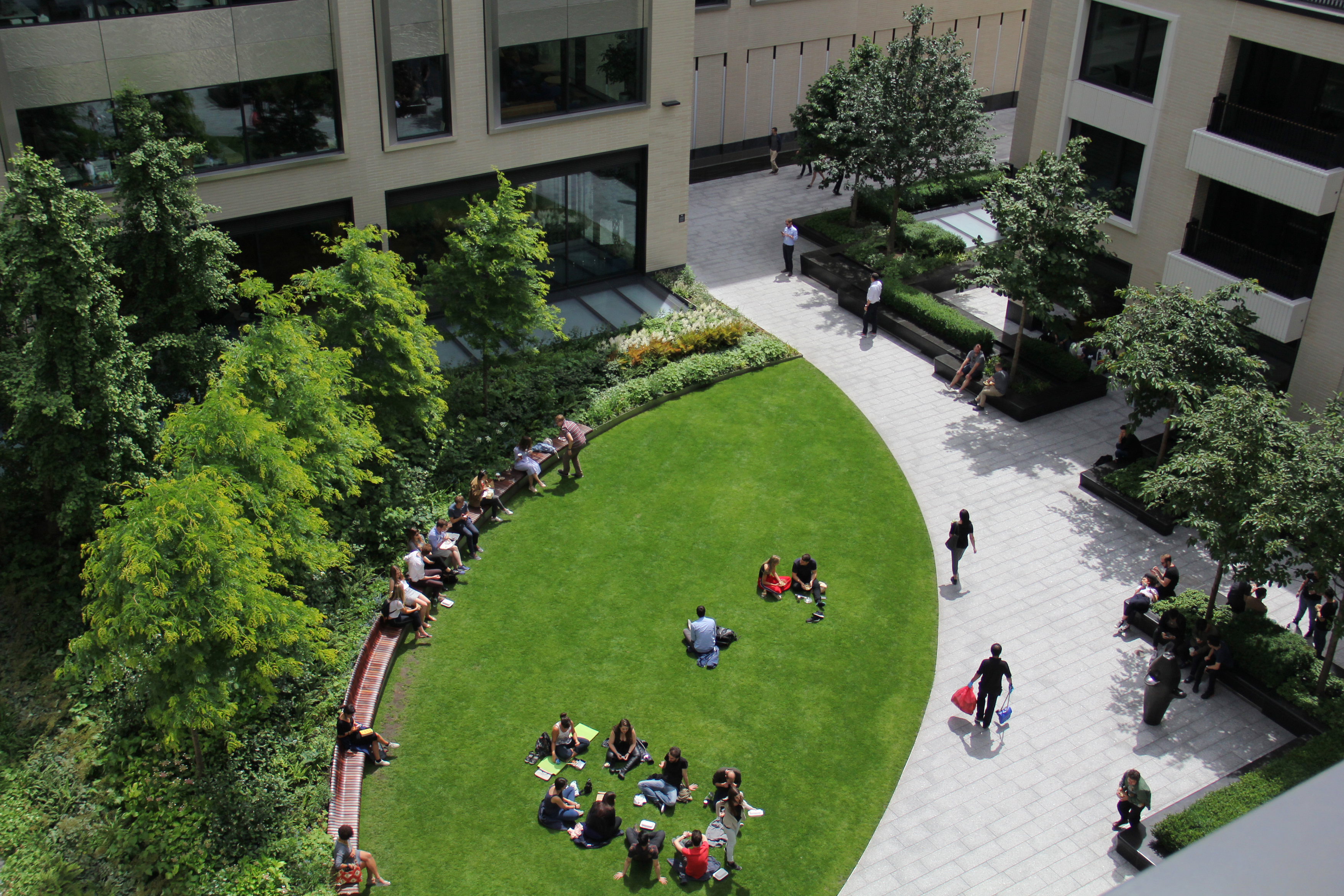 People using the landscaped courtyard at Rathbone Square